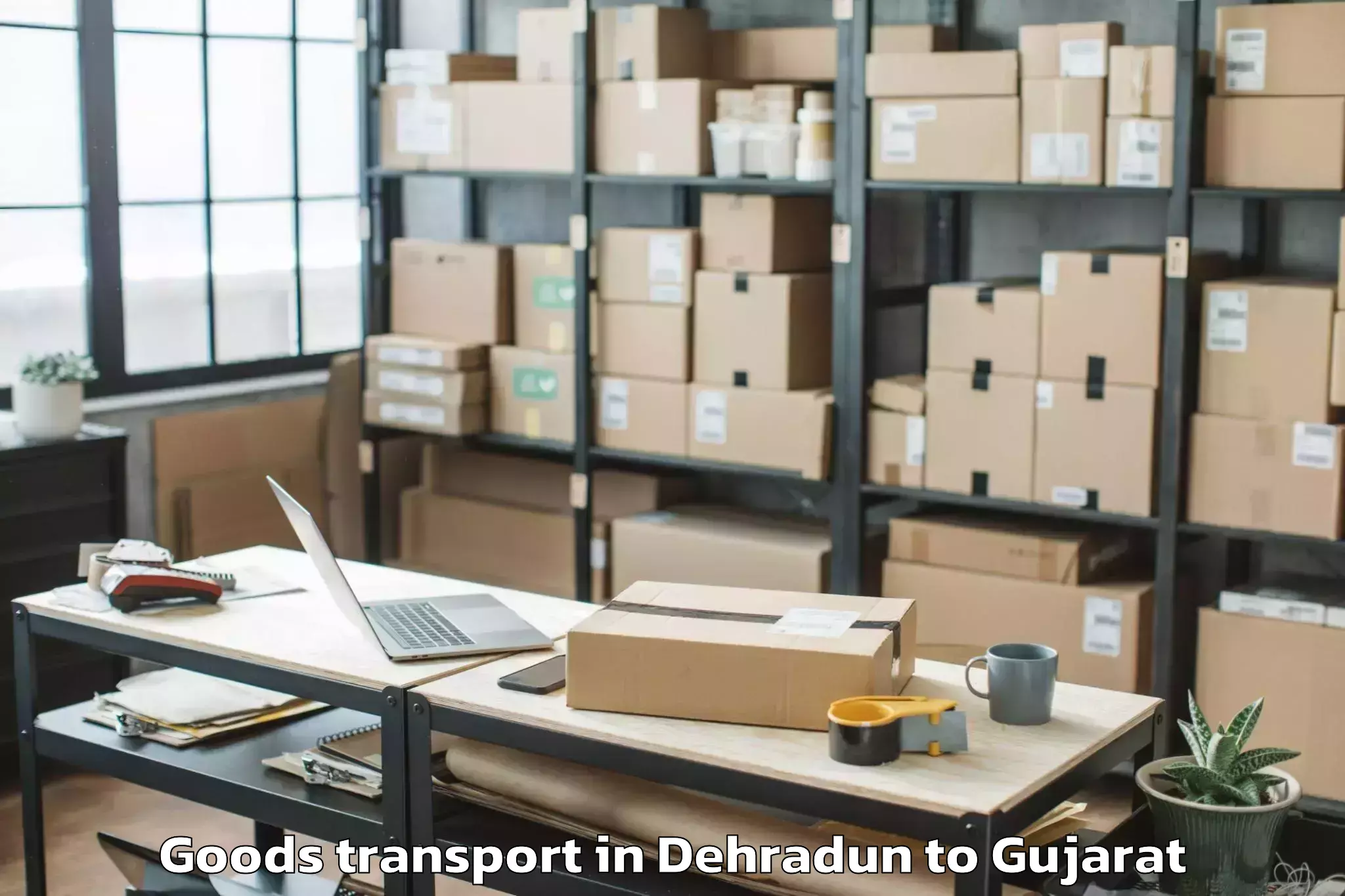 Leading Dehradun to Saurashtra University Rajkot Goods Transport Provider